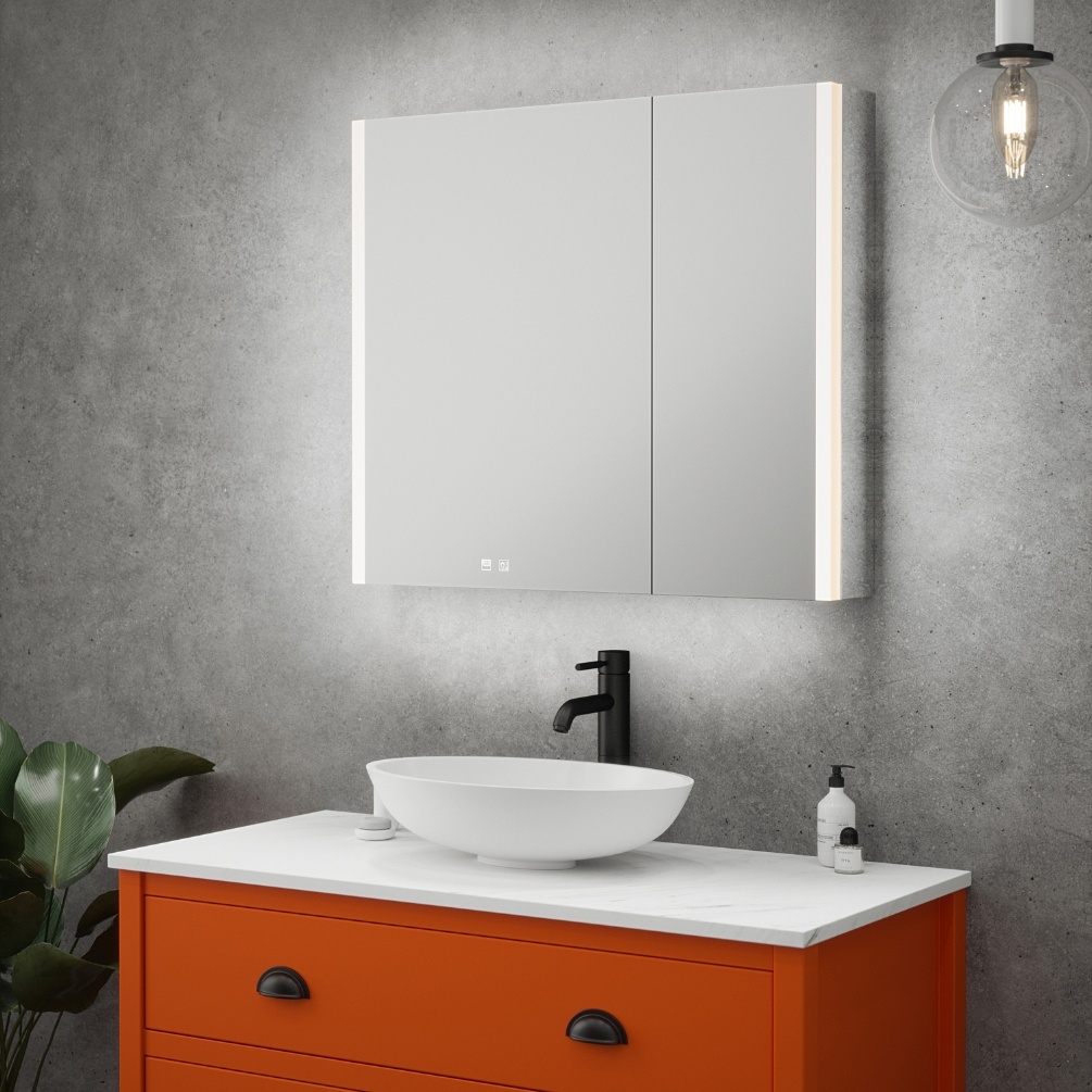 Product Lifestyle image of the Zurich Double Door LED Mirror Cabinet mounted above a vanity unit with countertop basin